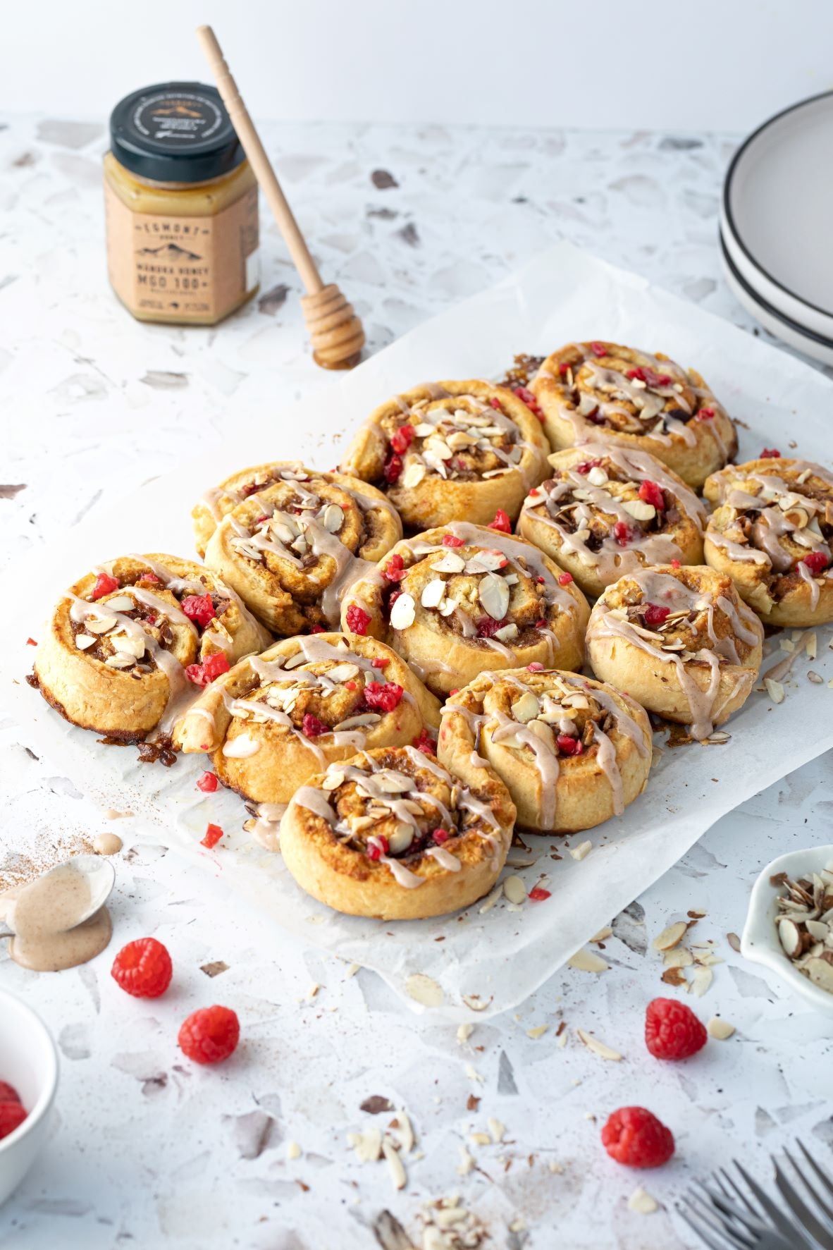 Egmont Honey – Sticky Honey, Raspberry & Almond Cinnamon Buns